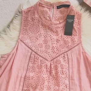 Pink eyelet open back top
